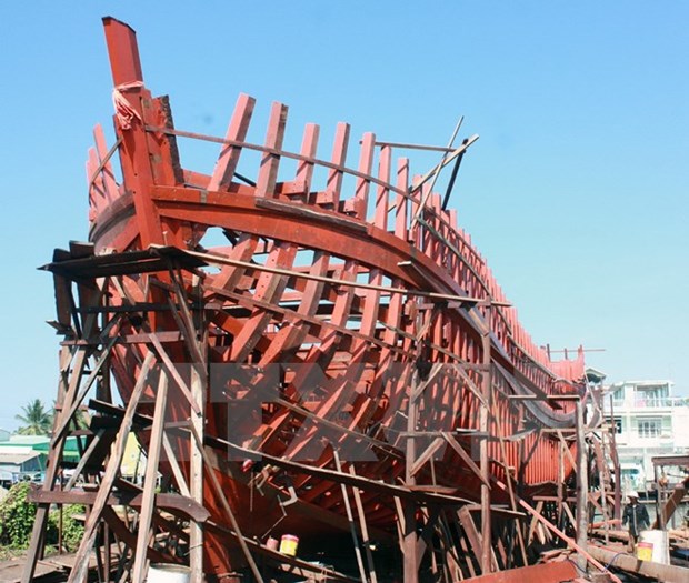 Quang Ngai : Vietcombank soutient la construction d’un bateau de peche hinh anh 1