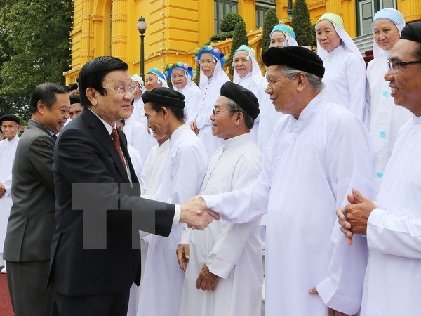Le president Truong Tan Sang recoit des dignitaires de l'Eglise caodaiste du Vietnam hinh anh 1