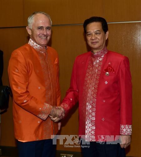 Le PM Nguyen Tan Dung rencontre son homologue australien hinh anh 1