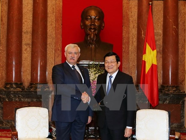 Le president Truong Tan Sang recoit le gouverneur de Saint-Petersbourg hinh anh 1