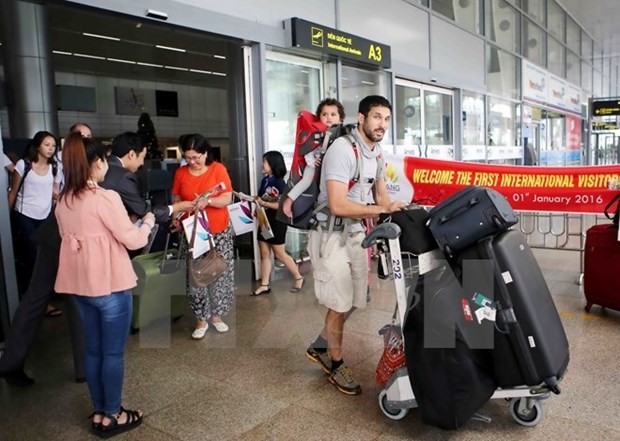 Afflux de touristes etrangers au Vietnam en fevrier hinh anh 1