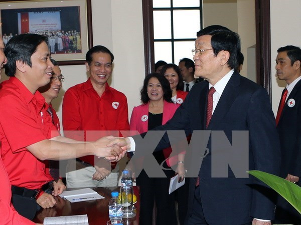 Le president Truong Tan Sang exhorte la Croix-Rouge a faire preuve d’initiative hinh anh 1