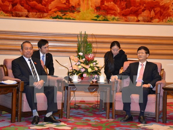 Une delegation de la Cour populaire supreme du Vietnam en visite en Chine hinh anh 1