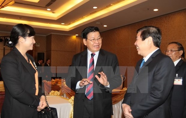 Le Premier ministre laotien termine sa visite au Vietnam hinh anh 1