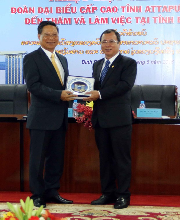 La province laotienne d’Attopeu cherche a cooperer dans l’investissement avec Binh Duong hinh anh 1