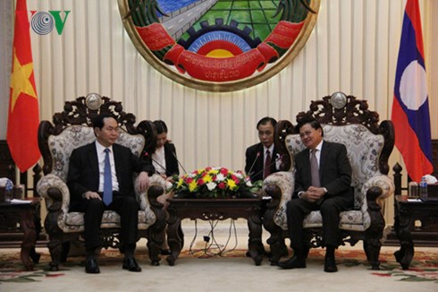 Le president Tran Dai Quang rencontre le PM et la presidente de l'AN du Laos hinh anh 1
