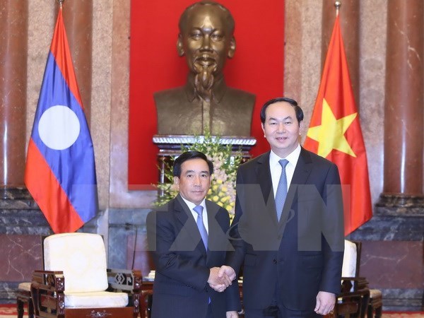 Le president Tran Dai Quang recoit le vice-president laotien Phankham Viphavanh hinh anh 1