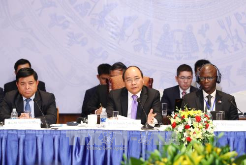 Le Premier ministre au Forum du developpement du Vietnam 2017 hinh anh 1