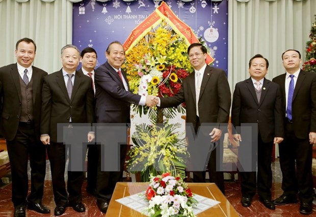 Noel : le vice-Premier ministre Truong Hoa Binh felicite les catholiques et protestants hinh anh 1