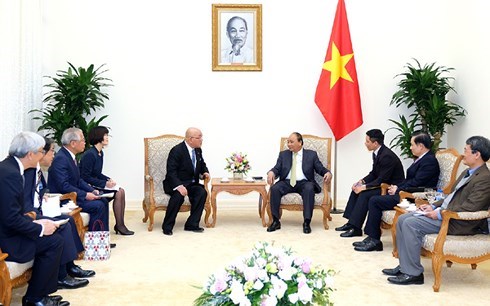 Le PM Nguyen Xuan Phuc recoit un conseiller du Premier ministre japonais hinh anh 1