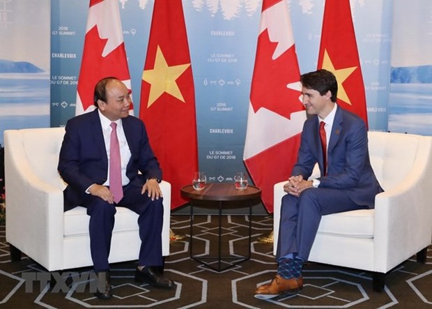 Justin Trudeau remercie Nguyen Xuan Phuc pour sa presence a la seance elargie du Sommet du G7 hinh anh 1