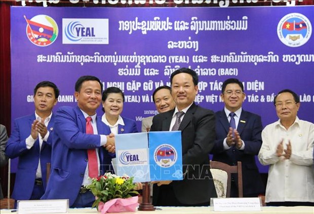 Les entreprises vietnamiennes et laotiennes renforcent leur cooperation hinh anh 1