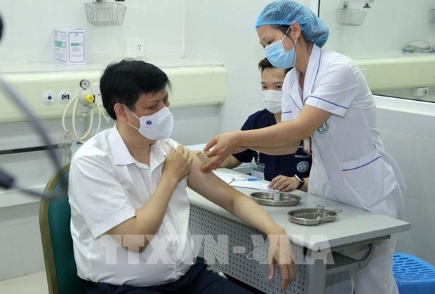 Covid-19 : securite maximale pour la campagne de vaccination deployee au Vietnam hinh anh 2