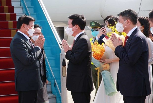 Le SG du Parti et president du Laos entame sa visite d’amitie officielle au Vietnam hinh anh 2