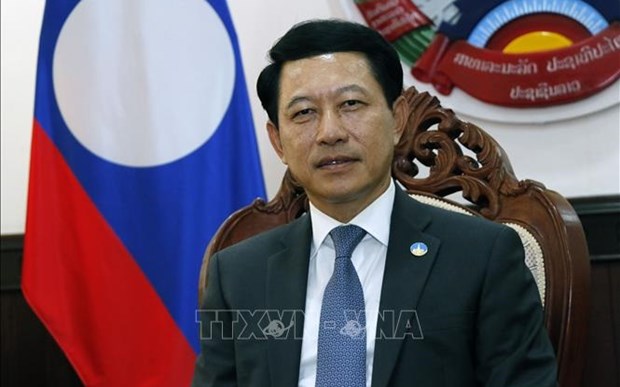 Le ministre lao des AE souligne l’importance de la visite au Laos du president vietnamien hinh anh 1