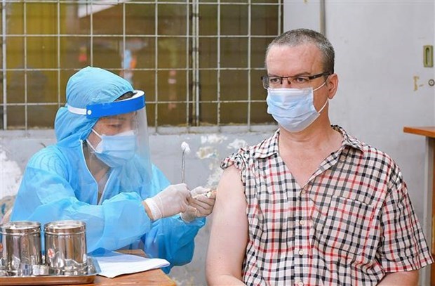 Covid-19 : Ho Chi Minh-Ville deploie un plan de vaccination pour les etrangers hinh anh 1