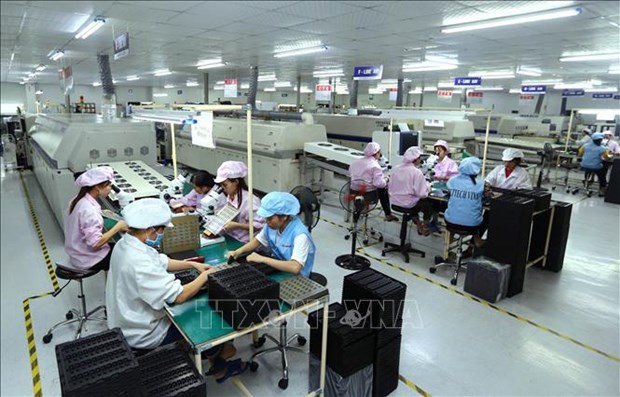 Covid-19 : les entreprises a Ho Chi Minh-Ville commencent la reouverture de leur production hinh anh 2