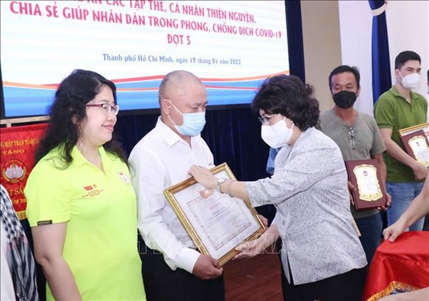 Covid-19: des organsiations caritatives honorees a Ho Chi Minh-Ville hinh anh 1