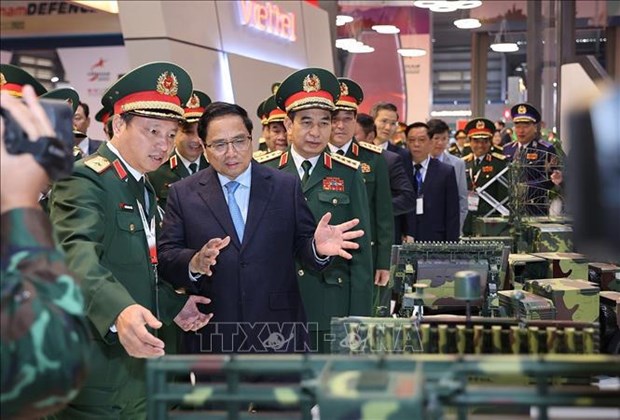 Le Premier ministre Pham Minh Chinh au premier Salon international de la defense du Vietnam hinh anh 3