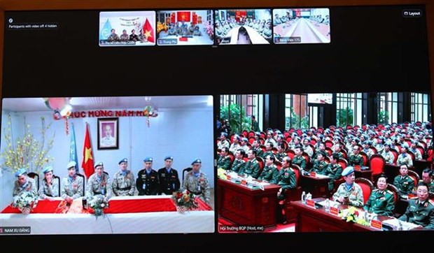 Programme en ligne lie aux forces vietnamiennes de maintien de la paix a l'occasion du Tet hinh anh 1