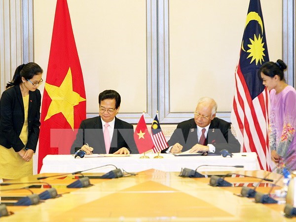 Nouvelles perspectives pour la cooperation entre le Vietnam et la Malaisie et Singapour hinh anh 1