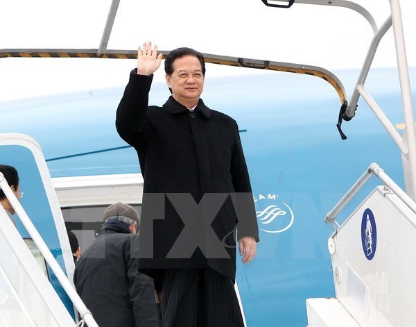 Le Premier ministre Nguyen Tan Dung arrive a Bruxelles hinh anh 1