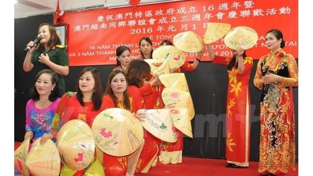 Les Vietnamiens en Allemagne et a Macao accueillent le Nouvel An hinh anh 2