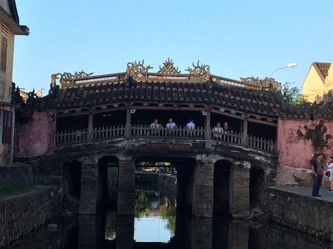Quatre ponts couverts impressionnants au Vietnam hinh anh 1