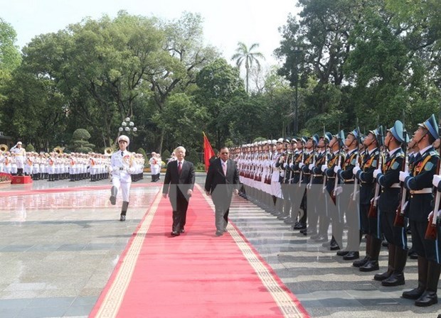Le secretaire general du Parti et president du Laos debute sa visite d'amitie officielle au Vietnam hinh anh 1