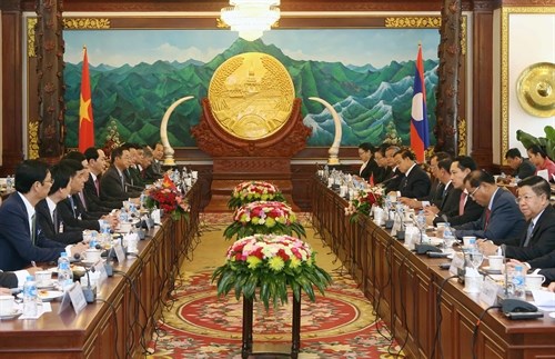 Le president Tran Dai Quang en visite d’Etat au Laos hinh anh 1