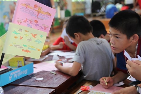 Hanoi : plus de 70 petits demunis s’engagent dans le projet «Les enfants lisent» hinh anh 2