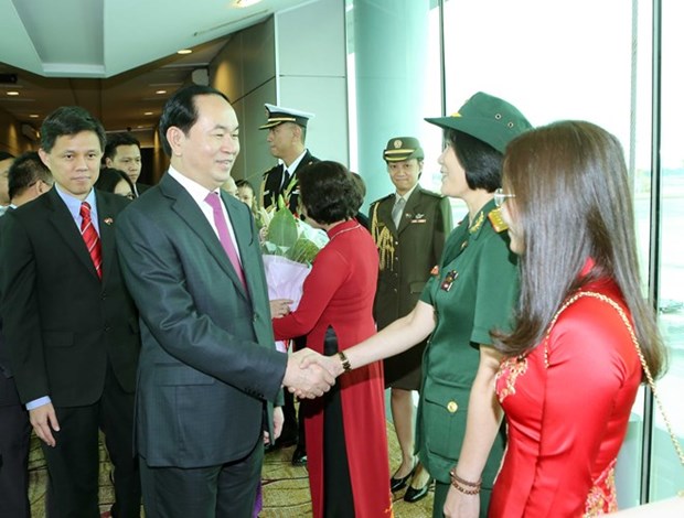 Le president Tran Dai Quang entame sa visite d'Etat a Singapour hinh anh 1