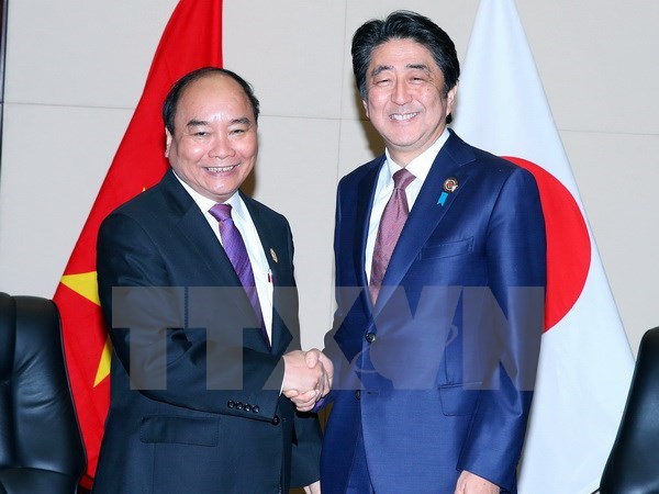 Le PM Nguyen Xuan Phuc rencontre ses homologues japonais et neo-zelandais hinh anh 1