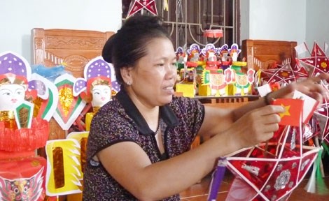 Les artisans de jouets traditionnels sous pression hinh anh 3