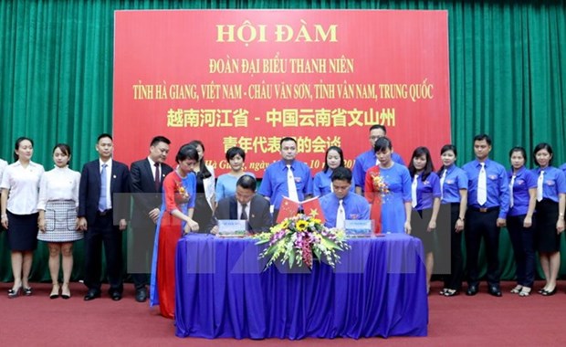 Echanges entre les jeunes vietnamiens et chinois hinh anh 1