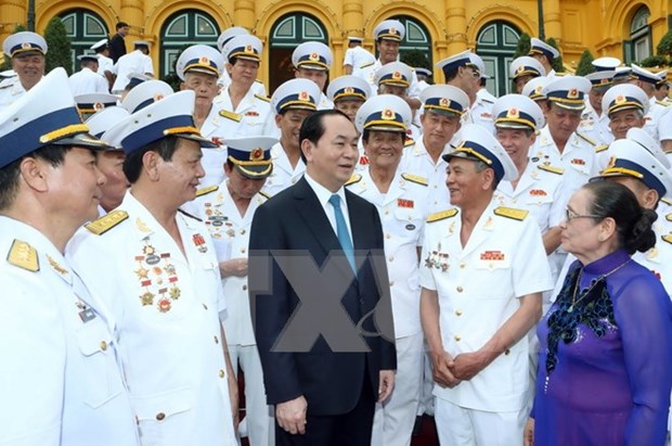 Le president rencontre des anciens combattants de la Piste Ho Chi Minh en mer hinh anh 1