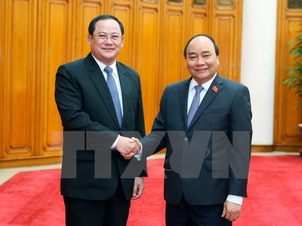 Le Vietnam et le Laos vont accelerer leurs projets d’investissement hinh anh 1