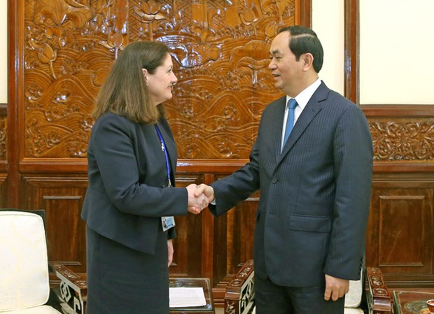 Le president Tran Dai Quang recoit le president du Centre national APEC Etats-Unis hinh anh 1