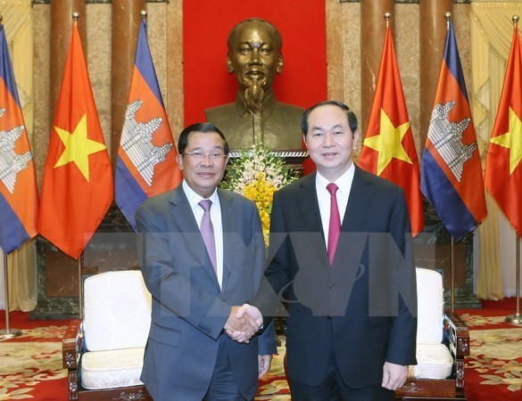 Le president Tran Dai Quang recoit le PM cambodgien Samdech Techo Hun Sen hinh anh 1