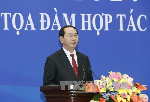 Tran Dai Quang au colloque de cooperation economique et commerciale Vietnam-Chine hinh anh 1