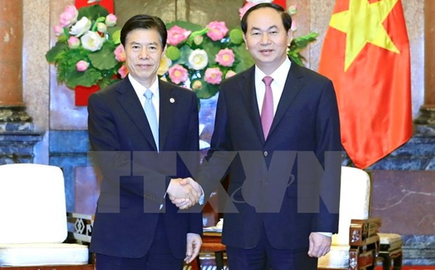 Le president Tran Dai Quang plaide pour le developpement des relations commerciales avec la Chine hinh anh 1