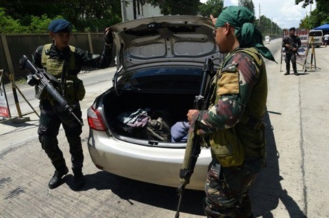 Philippines : plusieurs otages, dont un pretre, aux mains d'islamistes hinh anh 1