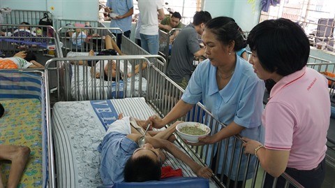 Ho Chi Minh-Ville : Des «Repas partages» pour les personnes en difficulte hinh anh 1