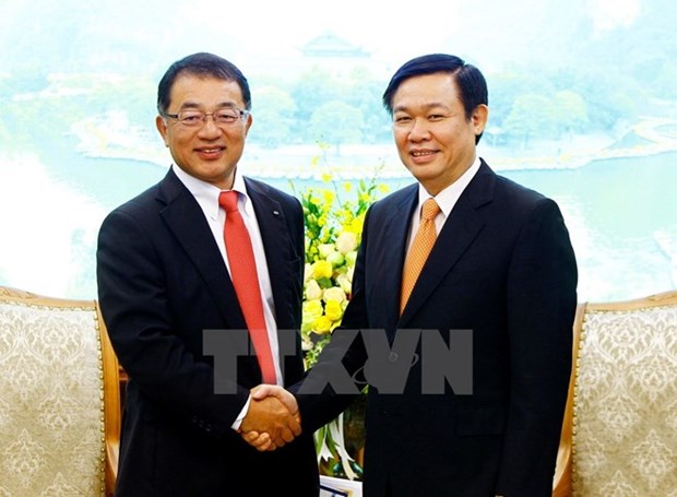 Le vice-PM Vuong Dinh Hue recoit un responsable du groupe japonais Kirin hinh anh 1