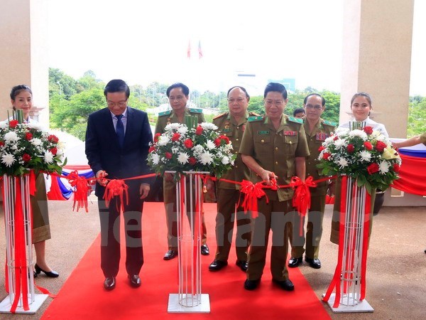 Exposition sur la cooperation entre les ministeres de la Securite publique Vietnam-Laos hinh anh 1