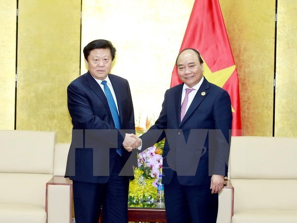 Le Premier ministre Nguyen Xuan Phuc recoit des responsables de grands groupes de l'APEC hinh anh 1