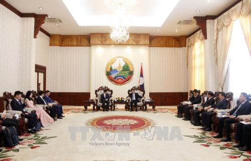 Le PM laotien Thongloun Sisoulith salue les aides de la VOV hinh anh 1