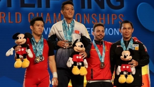 Championnats du monde d'halterophilie : le grand chelem pour Thach Kim Tuan hinh anh 1