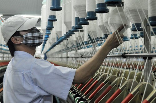 Le textile vietnamien table sur 33,5 milliards de dollars d’exportation en 2018 hinh anh 1