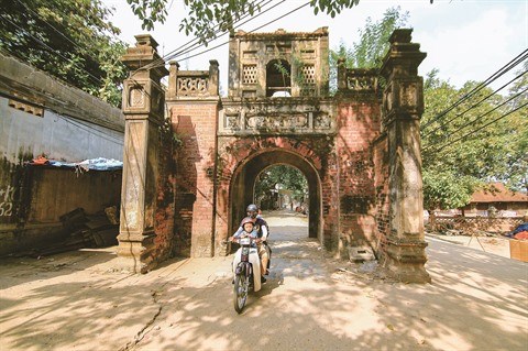 La porte du village, un symbole de la culture vietnamienne hinh anh 1